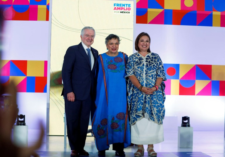 Former Mexican Senator Xochitel Gálvez poses for a photo with Santiago Creel and Beatriz Paredes during a private event as she seeks the nomination of opposition coalition Front Amplio for Mexico for the 2024 presidential election, in Monterrey.