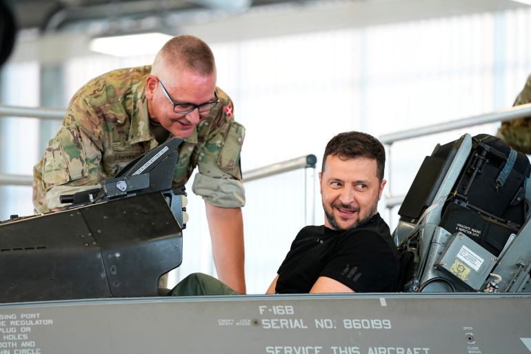 Ukrainian President Volodymyr Zelenskyy sits in an F-16 fighter jet at Skrydstrup Airbase in Vojens, Denmark, August 20, 2023.