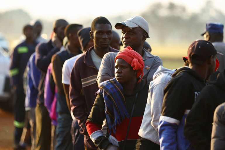 People wait to cast their vote during the Zimbabwe general elections in Kwekwe, Zimbabwe August 23, 2023