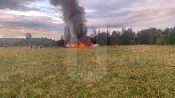A view shows plane wreckage on fire following an alleged air accident at a location given as Tver region, Russia