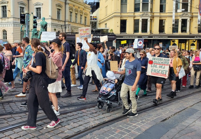 People participate in anti-racism protest