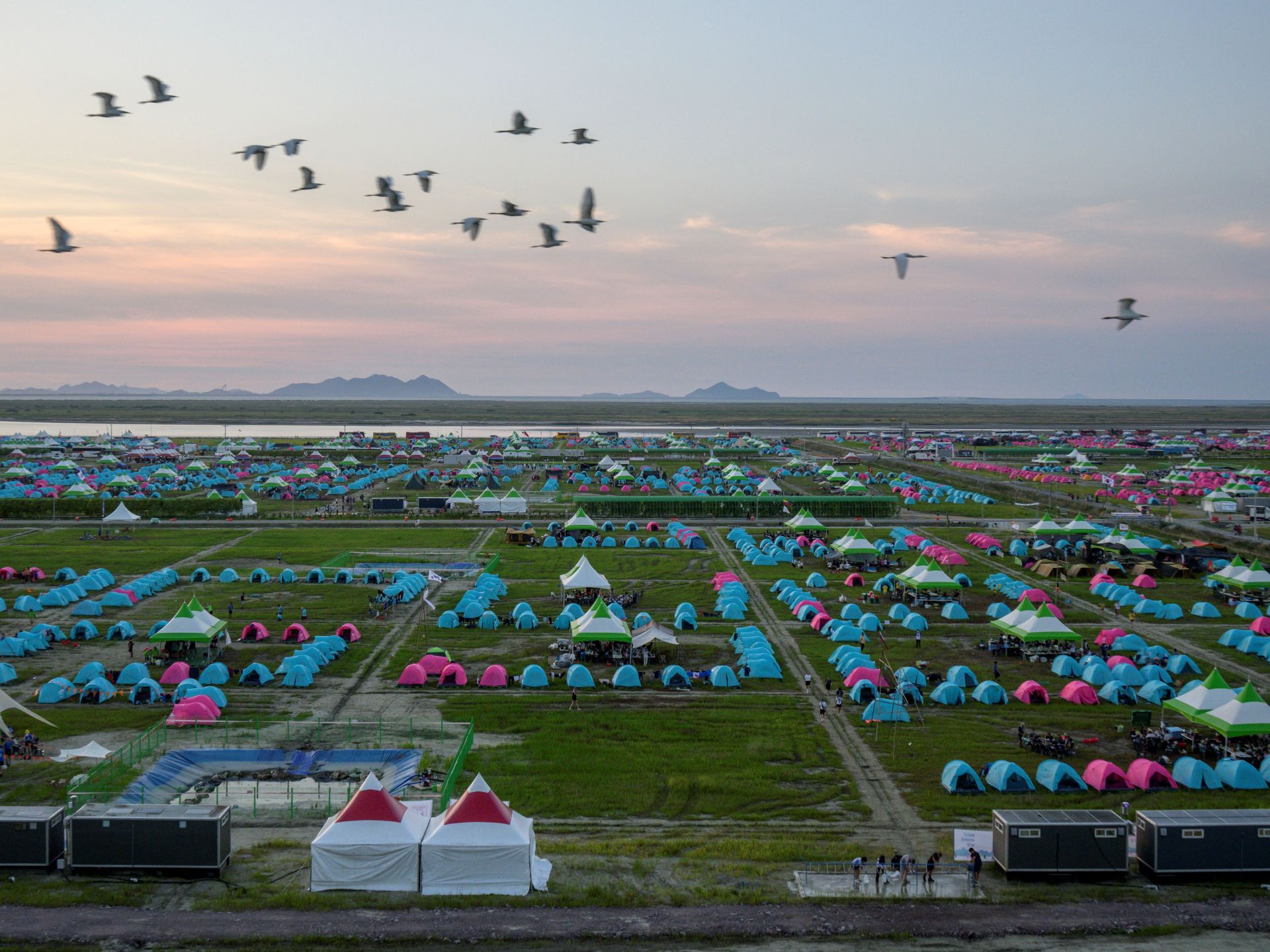S Korea’s heatwave-hit scout jamboree to end early over typhoon warning