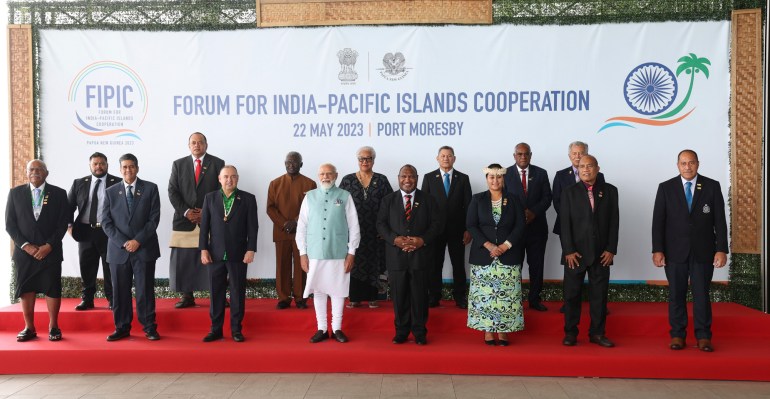 In this photo released by India's Press Information Bureau, Indian Prime Minister Narendra Modi, fourth left, front row, poses with leaders of the Forum for India-Pacific Islands Cooperation (FIPIC) in Port Moresby, Papua New Guinea, Monday, May 22, 2023. Modi is meeting with Pacific leaders to discuss better cooperation. (Press Information Bureau via AP)