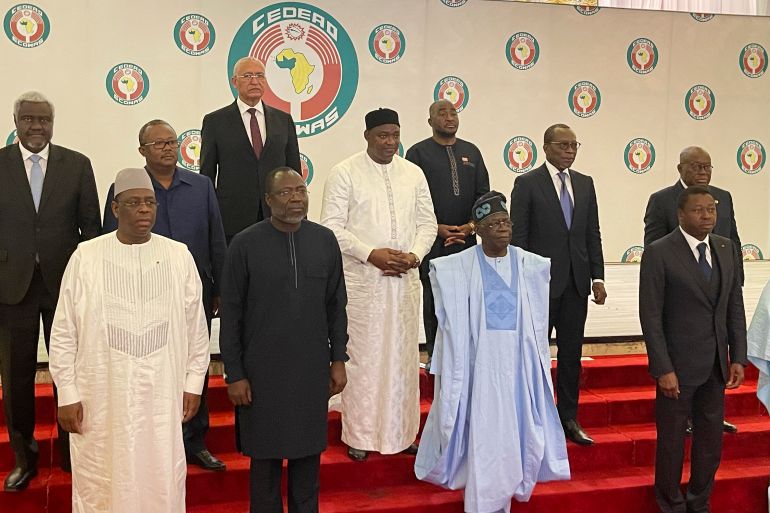 Nigeria President Bola Tinubu, second from left, poses with other West Africa leaders after a meeting in Abuja Nigeria, July 30, 2023
