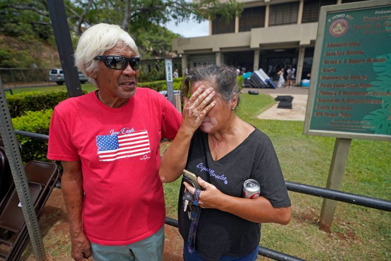 Hawaii residents cry in the aftermath of devastating wildfires on Maui
