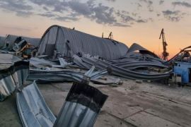 In this photo provided by the Odesa Regional Administration Press Office, a granary destroyed in a Russian drone attack at night is seen in a Danube port near Odesa, Ukraine, early hours Wednesday, Aug. 16, 2023. (Odesa Regional Administration Press Office via AP)