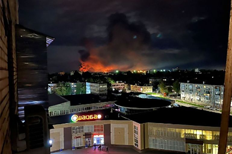 This image made from a social media and and provided by Ostorozhno Novosti shows smoke billowing over the city and a large blaze in Pskov, Russia, on Aug. 29, 2023. Russian officials accused Ukraine of targeting six Russian regions early Wednesday in what appeared to be the biggest drone attack on Russian soil since Moscow sent troops into Ukraine 18 months ago. (Ostorozhno Novosti via AP)