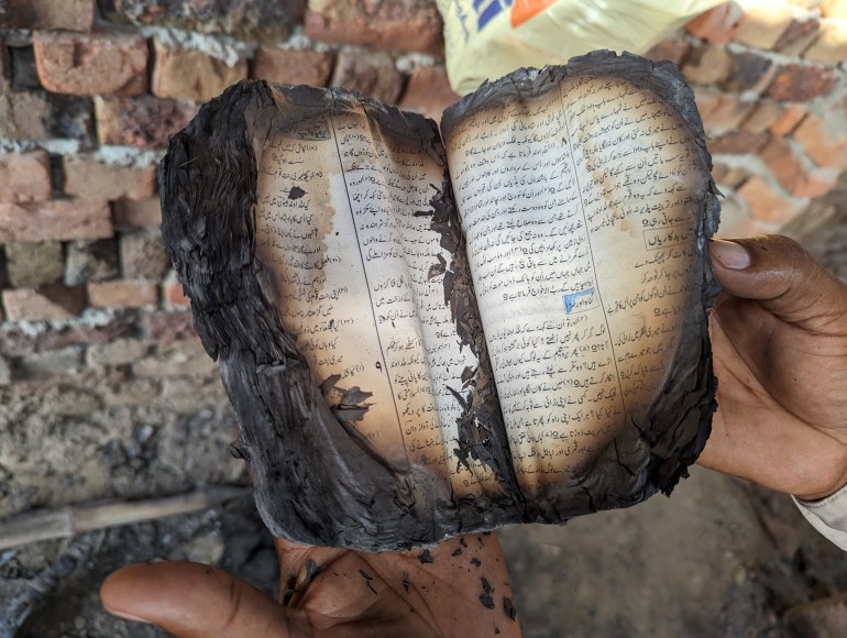 Copy of bible burnt in Sat Sangat church