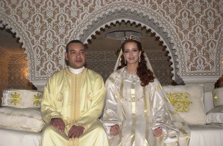 King Mohammed VI sits with Lalla Salma during one of the celebrations of their marriage