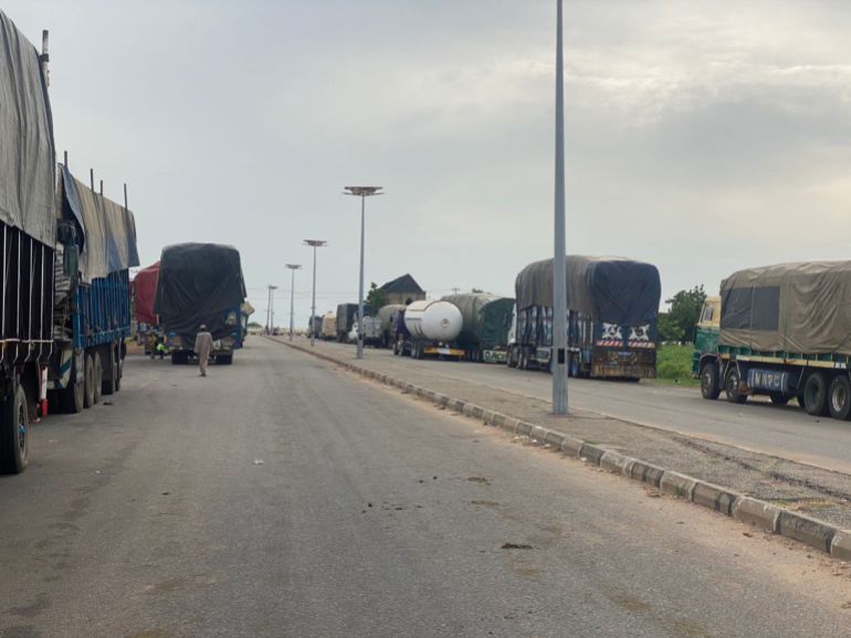 Freight trucks parked at the Jibiya border between Nigeria and Niger on August 10, 2023 due to closure of borders between both countries after July 26 coup