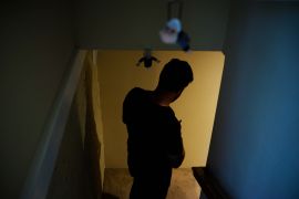 An Afghan refugee Yasin seen at the entrance to a basement in the US