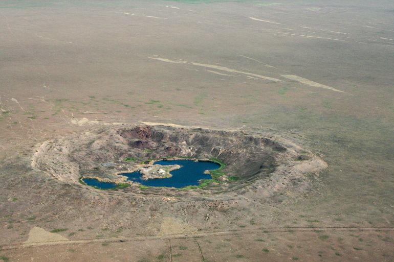 Craters and boreholes dot the former Soviet Union nuclear test site Semipalatinsk in what is today Kazakhstan.