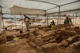 A team of technicians and engineers work in the Roman cemetery site northwest of Gaza [Abdelhakim Abu Riash/Al Jazeera]