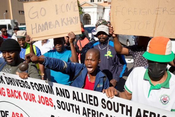 Members of the South African anti-migrant group Operation Dudula march on the Diakonia Council of Churches offices, demanding they cease assisting undocumented African immigrants
