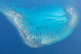 An aerial view of Iroquois Reef, frequented by Filipino fishermen and part of the Philippine 200-mile exclusive economic zone, in the South China Sea, March 9, 2023. [Reuters/Eloisa Lopez/file]