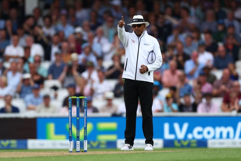 Cricket - Ashes - Fifth Test - England v Australia - The Oval, London, Britain - July 28, 2023 The on field umpire gives out for Australia's Pat Cummins before the decision is overturned following a review Action Images via Reuters/Andrew Boyers