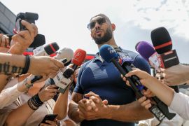 Andrew Tate delivers a press statement outside his house in Voluntari, Ilfov, Romania, August 4, 2023. Inquam Photos/George Calin via REUTERS ATTENTION EDITORS - THIS IMAGE WAS PROVIDED BY A THIRD PARTY. ROMANIA OUT. NO COMMERCIAL OR EDITORIAL SALES IN ROMANIA