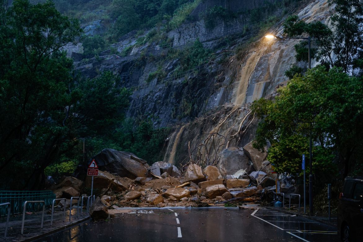 A view of a road blocked due to the debris of a landside after heavy rains, in Hong Kong