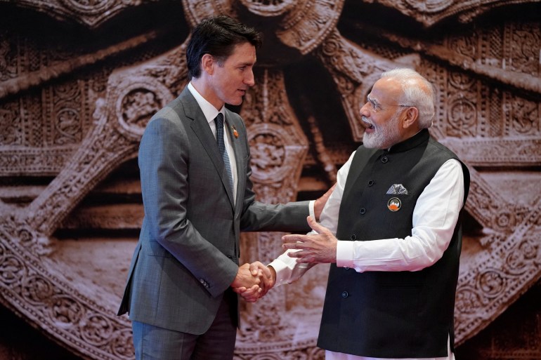 Canadian Prime Minister Justin Trudeau shakes hands with his Indian counterpart Narendra Modi at the G20 summit in New Delhi