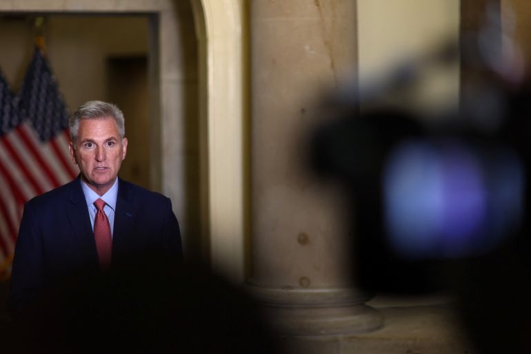 Video cameras film a news conference by Kevin McCarthy at the US Capitol