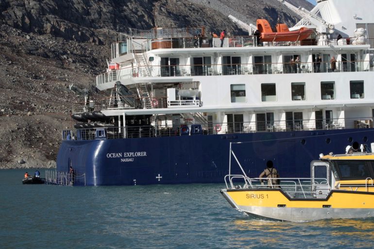 View of the Ocean Explorer, a luxury cruise ship carrying 206 people that ran aground, in Alpefjord, Greenland