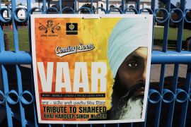 A sign outside the Guru Nanak Sikh Gurdwara is seen after the killing on its grounds in June 2023 of Sikh leader Hardeep Singh Nijjar, in Surrey, British Columbia, Canada [File: Chris Helgren/Reuters]