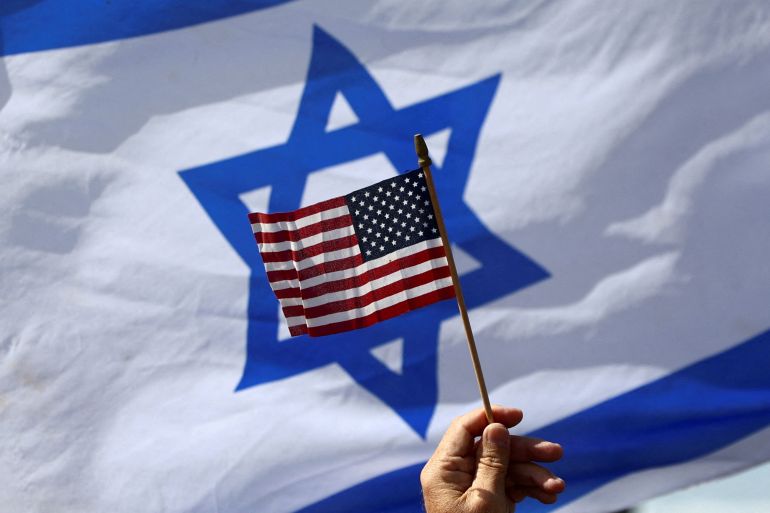 Israeli flag with smaller US flag in the middle