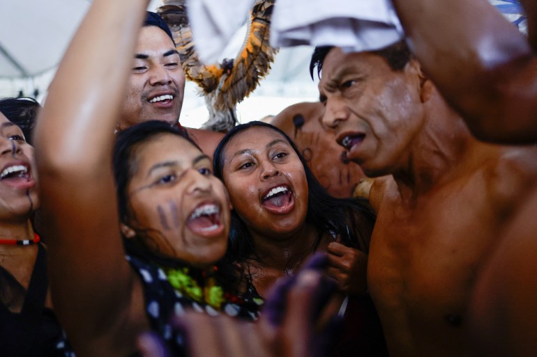 Brazilian Xokleng Indigenous people celebrate after a majority on Brazil's Supreme Court voted against the so-called legal thesis of 'Marco Temporal' (Temporal Milestone), in Brasilia, Brazil September 21, 2023. 