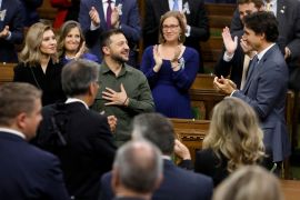 Ukraine&#39;s President Volodymyr Zelenskyy receives a standing ovation in the House of Commons as he delivers a speech on September 22 [Blair Gable/Reuters pool]