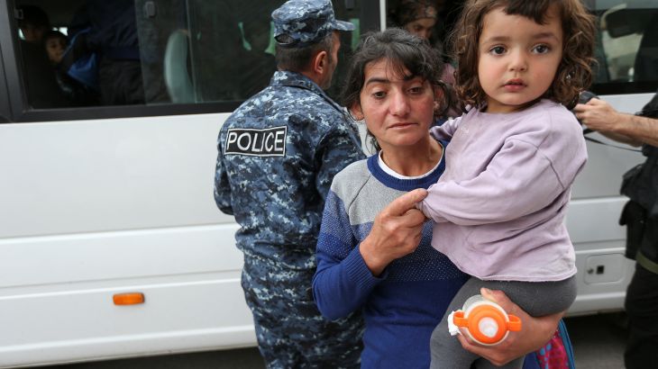 Refugees from Nagorno-Karabakh region arrive at a temporary accommodation centre in the town of Goris, Armenia.