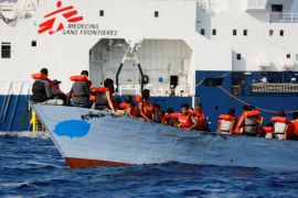 A group of 61 people on a wooden boat are rescued by crew members of the Geo Barents migrant rescue ship in international waters off the coast of Libya [File: Darrin Zammit Lupi/Reuters]