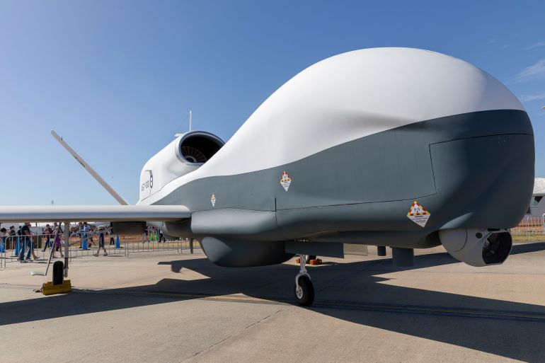 A replica MQ-4C Triton drone on display at an Australian air show. It has a bulbous nose