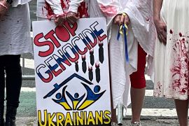Demonstrators protest against Russia's war on Ukraine, in front of the UN headquarters in New York.