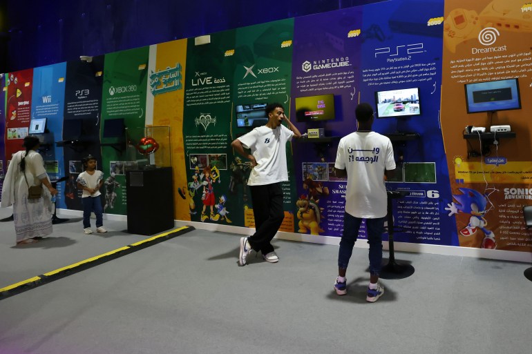 People visit a museum of video game history, part of Gamers8, an eight-week festival of eSports tournaments, in Riyadh