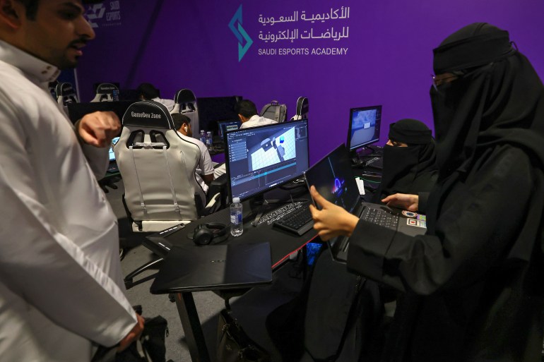 Saudi trainees attend a training course at the Saudi Esport Academy in Riyadh