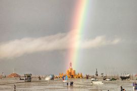 A rainbow over the water-logged Burning Man site in Nevada.