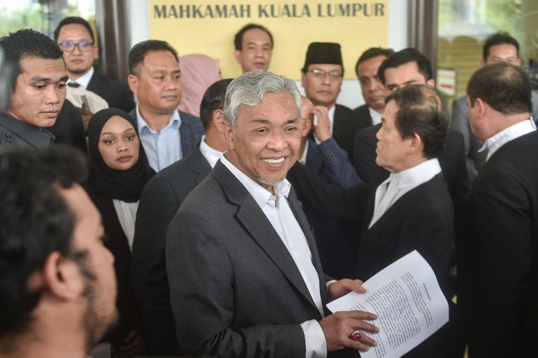 Zahid smiling after the court delivered its decision