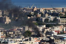 Smoke billows during clashes in the Ain el-Helweh camp for Palestinian refugees, in Lebanon's southern coastal city of Sidon
