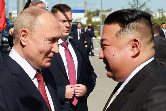 In this pool photo distributed by Sputnik agency, Russia's President Vladimir Putin (L) shakes hands with North Korea's leader Kim Jong Un during their meeting at the Vostochny Cosmodrome in Amur region on September 13, 2023. - Russian President Vladimir Putin and North Korean leader Kim Jong Un both arrived at the Vostochny Cosmodrome in Russia's Far East, Russian news agencies reported on September 13, ahead of planned talks that could lead to a weapons deal. (Photo by Vladimir SMIRNOV / POOL / AFP)