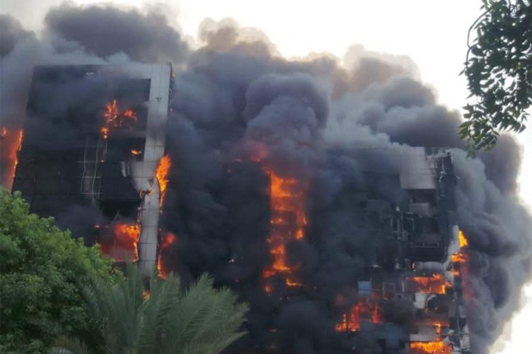 a raging fire at the Greater Nile Petroleum Oil Company Tower in Khartoum