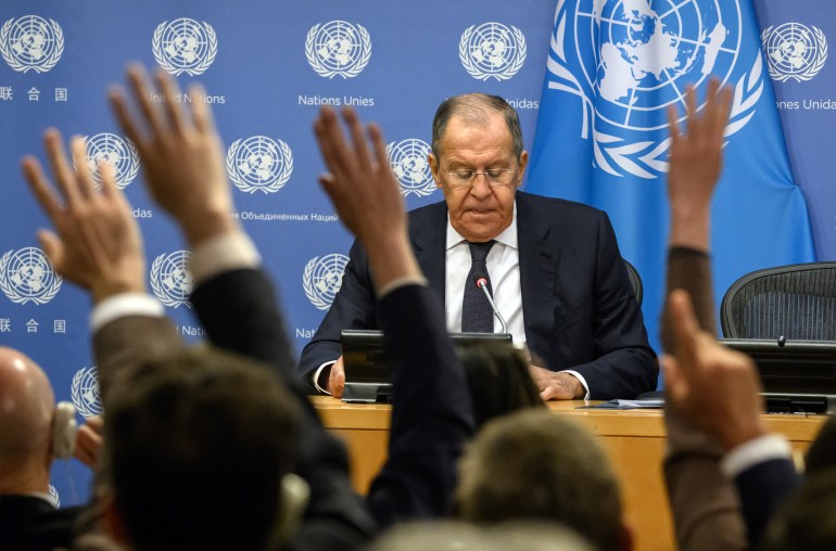 Reporters ask questions as Russia's Foreign Minister Sergey Lavrov