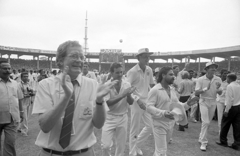 Led by Australian team manager Alan Crompton, left to right: teammates Peter Taylor; Michael Veletta and David Boon applaud the congratulations offered by spectators after beating defending champions India at the Cricket World Cup on Oct. 9, 1987 in Madras, India. Australia won by one run 270-269.