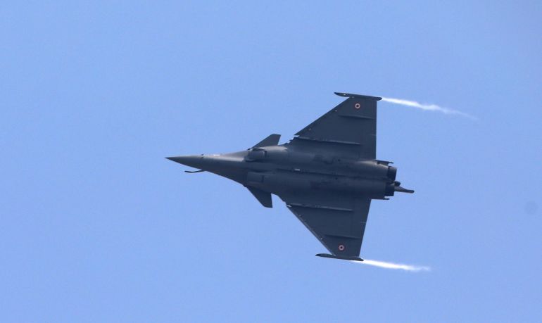 A French-made Rafale fighter jet flies during its induction ceremony at the Indian Air Force Station in Ambala, India, Thursday, Sept.10, 2020. The first batch of five planes, part of a $8.78 billion deal signed between the two countries in 2016 had arrived here in July. (AP Photo/Manish Swarup)