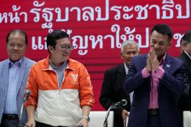 Secretary of the Move Forward Party Chaithawat Tulathon, left, and leader of Pheu Thai party Chonlanan Srikaew, right, at a joint news conference [File: Sakchai Lalit/AP Photo]