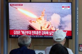 A TV screen shows an image of North Korea's missile launch during a news program at the Seoul Railway Station in Seoul, South Korea, Monday, Aug. 21, 2023. North Korean leader Kim Jong Un observed the test-firing of strategic cruise missiles, state media reported Monday, as the U.S. and South Korean militaries kicked off major annual drills that the North views as an invasion rehearsal.