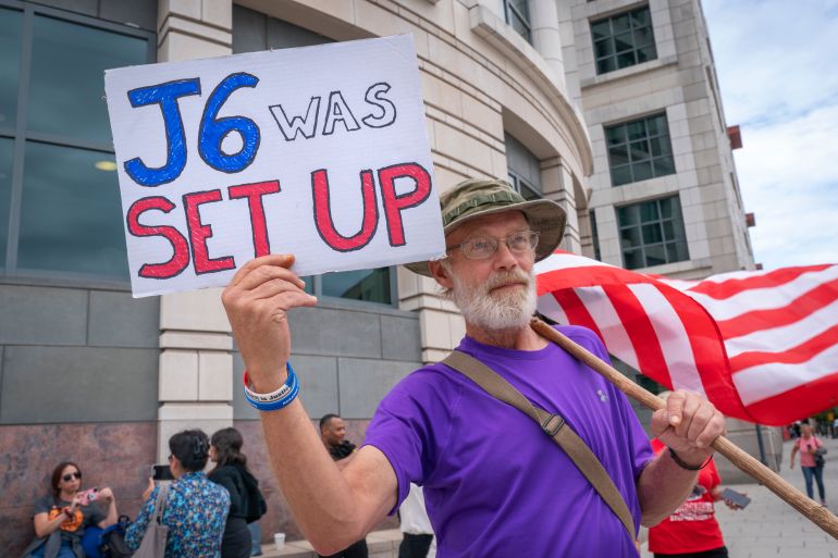 Jericho Steve, of Pennsylvania, a supporter of the January 6th defendants and former President Donald Trump, protests outside federal court, Wednesday, Aug. 30, 2023, in Washington, where sentencing had been expected for members of the far-right extremist group the Proud Boys, including former Proud Boys leader Enrique Tarrio and member Ethan Nordean who were convicted on charges of seditious conspiracy in the Jan. 6 attack. The sentencing was rescheduled to Sept. 5. (AP Photo/Jacquelyn Martin)