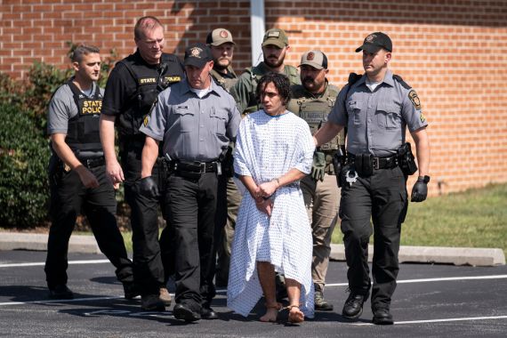 Law enforcement officers escort Danelo Cavalcante from a Pennsylvania State Police barracks in Avondale Pa., on Wednesday, Sept. 13, 2023. Cavalcante was captured Wednesday after eluding hundreds of searchers for two weeks. (AP Photo/Matt Rourke)
