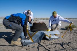The sample was collected from the capsule&#39;s landing site in Utah and transported to a temporary clean room, where it was cleaned and disassembled [Keegan Barber/NASA via AP]