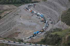 A convoy of cars of ethnic Armenians from Nagorno-Karabakh moves towards Kornidzor in the Syunik region, Armenia [Vasily Krestyaninov/AP Photo]