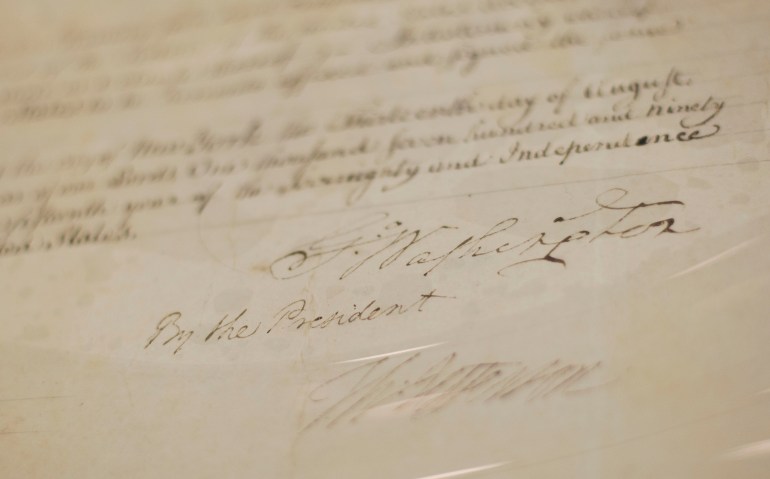 A close-up of George Washington's signature on a treaty with Muscogee Nations.